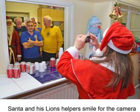 Santa and Lions Helpers are caught on camera